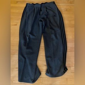 Dark gray Adida’s sweatpants.